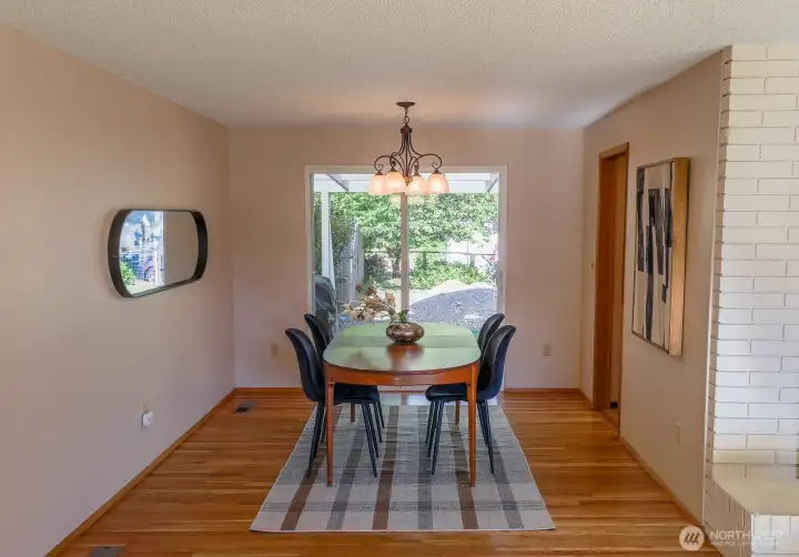dining room with sliding glass doors to covered back patio
