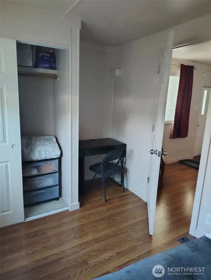 2nd Bedroom with convenient desk.  All bedroom furnishings stay with the home.