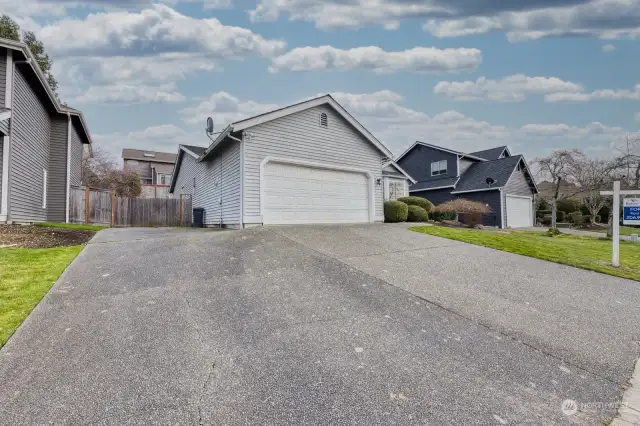 huge 3-car wide driveway and extra deep