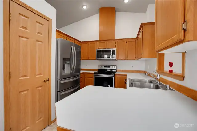 You will love the kitchen. Plenty of counter space, storage and the newer stainless steel appliance package is a real head turner. To the left is an oversized pantry, you can never have enough storage!