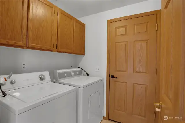 Don't overlook the laundry room! Nice storage here and this space acts like a convenient mud room when coming in from the garage. The washer and dryer are included in the sale!