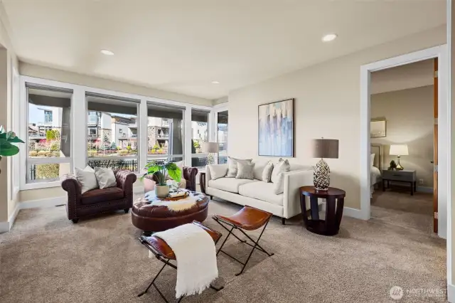 Sit back and enjoy this open and spacious Family Room Space with Views of the Lake and Pond located on the main entry level.