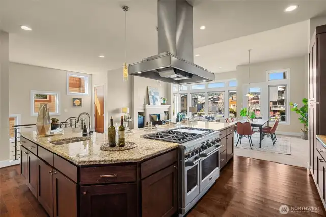 The Kitchen features the Stainless Steel Hood, 6 Burner Stove with Dual Ovens, Prep Sink and Impressive Granite Counter space!