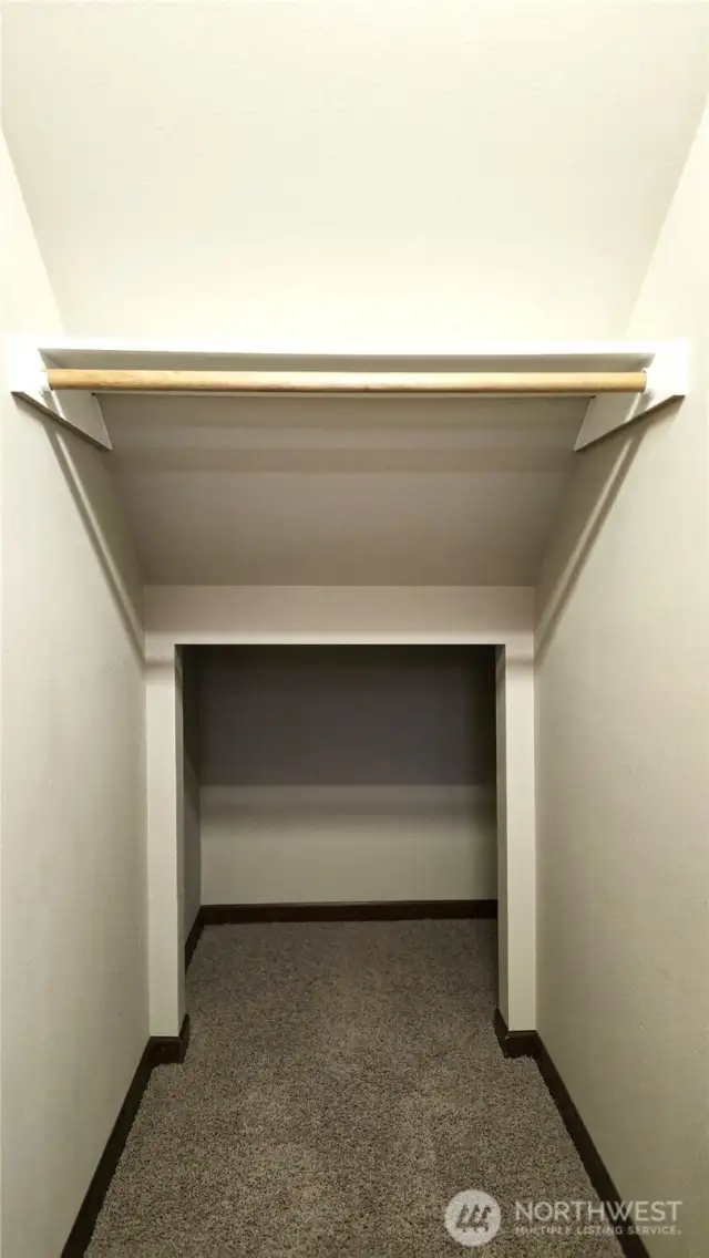 The hall closet continues underneath the stairs to capture additional storage opportunities.