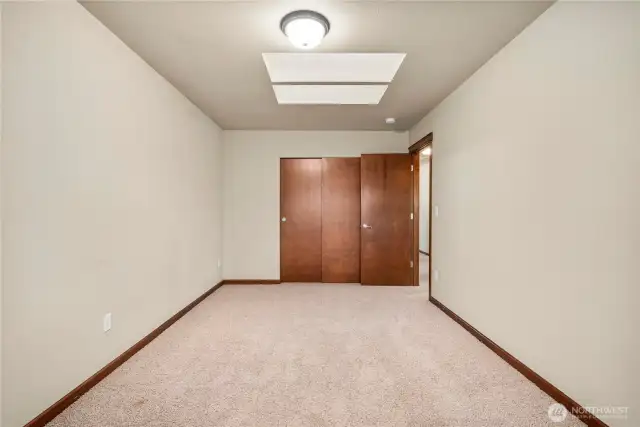 Bedroom 3 with more skylights.