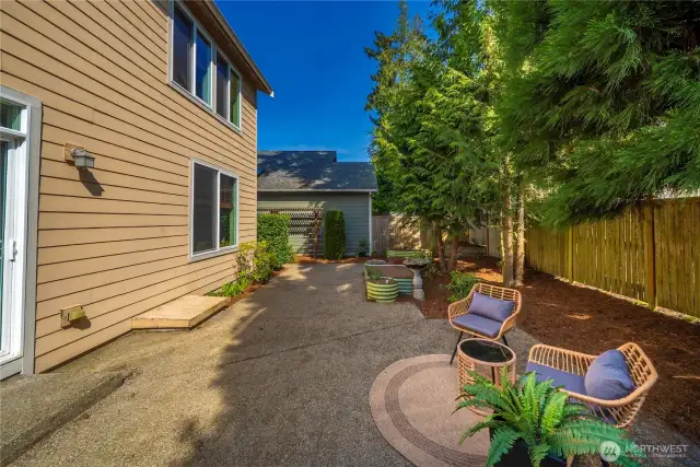 Mature landscaping provides a green backdrop and shade in the summer.
