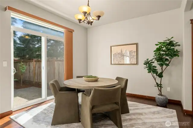 Spacious dining area with views and access to the back patio.