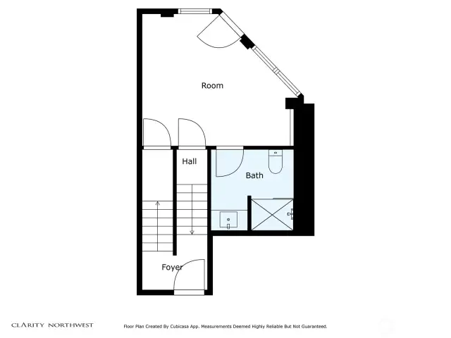First floor plan.  The exterior door at the upper section is the 34th Avenue entrance to the commercial space labeled "Room".  The exterior door at the "Foyer" area is the back door that can bring one separately into the living spaces on the second and third floors so as not to disturb the commercial part of the townhouse.