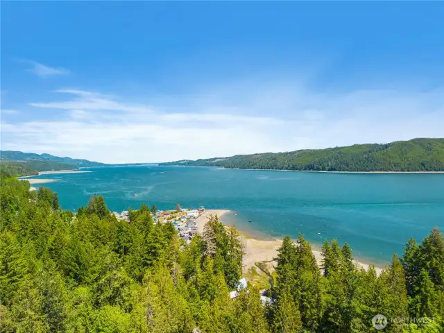 Aerial view highlights the property's proximity to Hood Canal and its scenic surroundings.