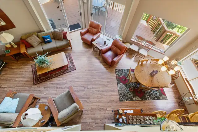 Upstairs balcony overlooks the main living area, adding openness and architectural interest.