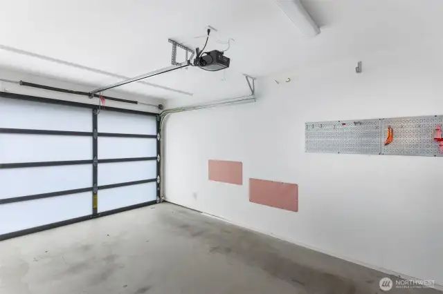 Large, clean one-car garage w/ extra off-street parking spot in front of garage.