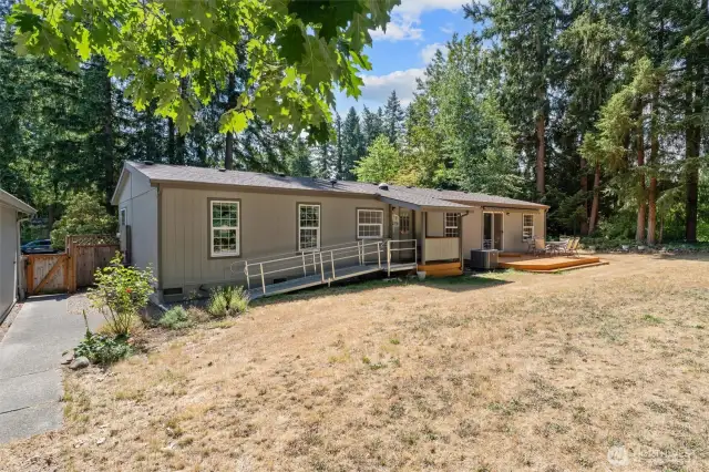 Back side of home features a ramp