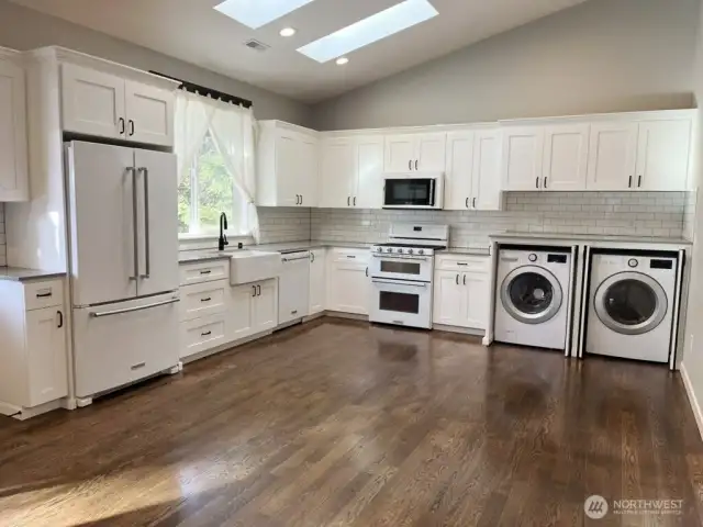 ADU hidden laundry area located in kitchen