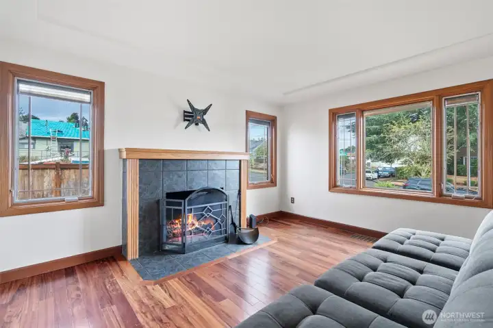 Spacious, light filled Living Room with cozy fireplace.