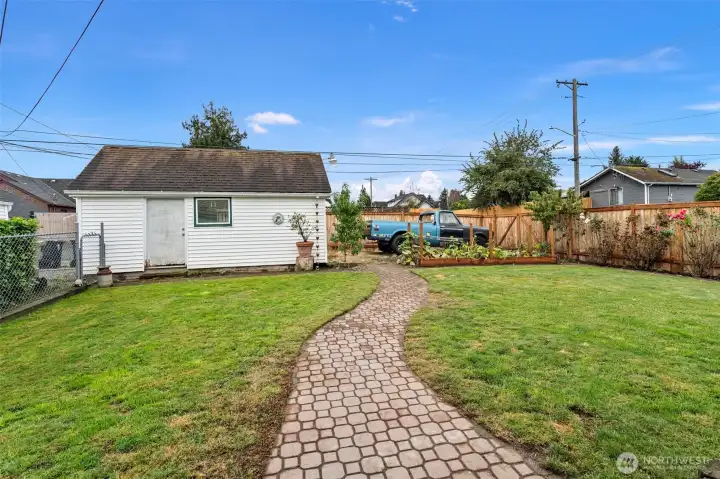 Detached garage with additional off-street parking.
