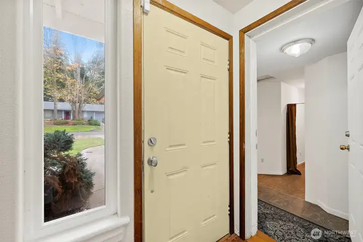 Entryway vestibule, door on the left leads to the studio (garage conversion)