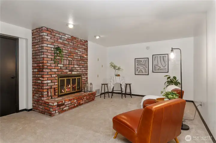Lower level recroom with wood burning fireplace