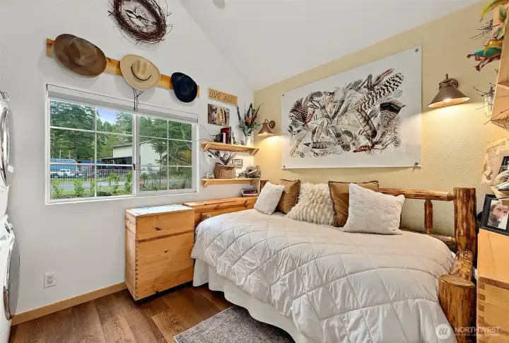 Peaceful bedroom featuring natural light and a thoughtfully designed layout.