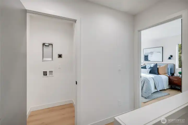 Convenient washer and dryer hook-ups in the utility room, located adjacent to the primary suite.