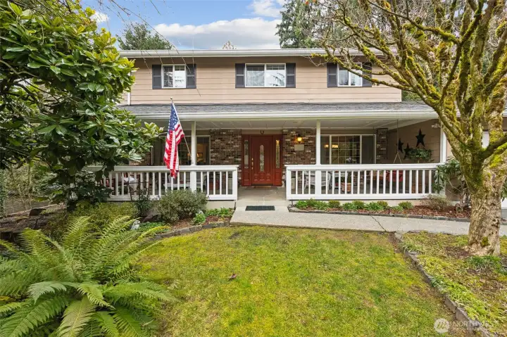 A covered front porch you could only wish for!