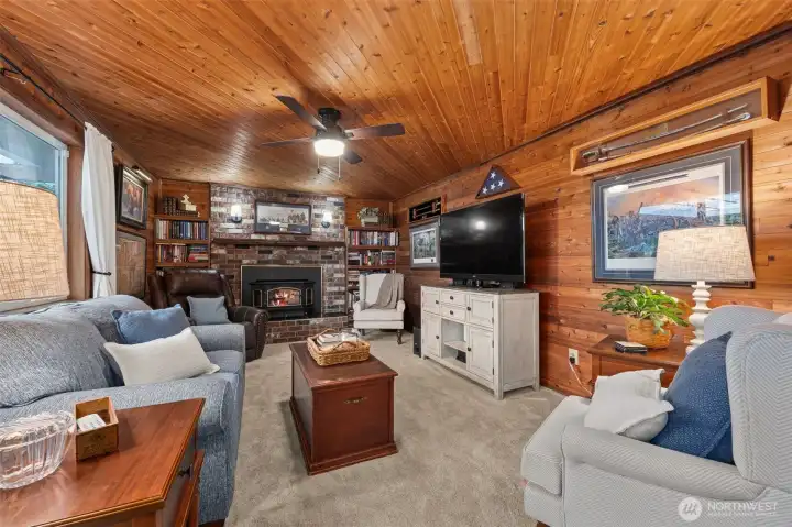 Cozy bonus room with a wood stove.