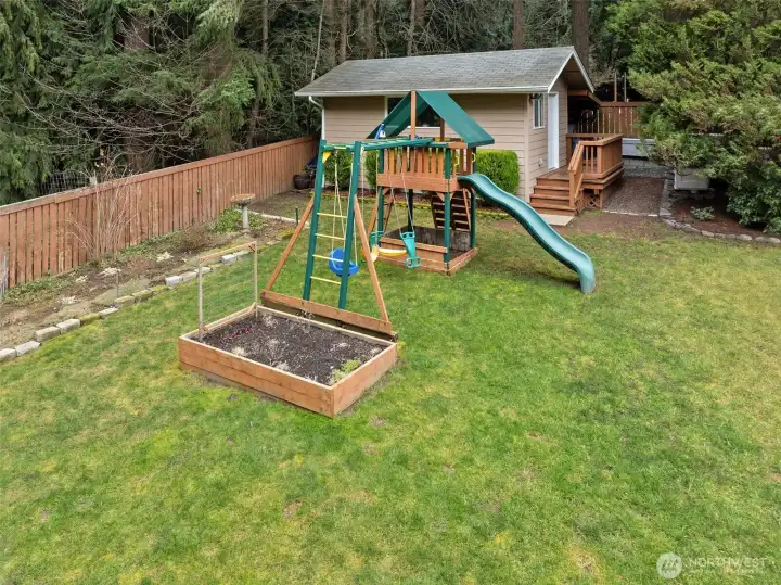 Room for a garden and a swing set.