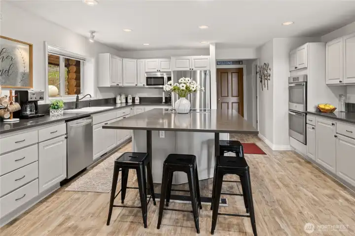 The expansive kitchen is ideal for entertaining and hosting gatherings.