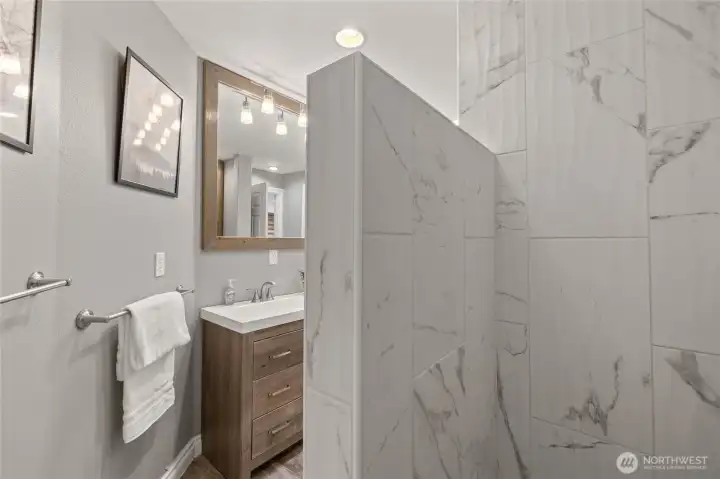 Beautiful tiled shower in the newly added bathroom.