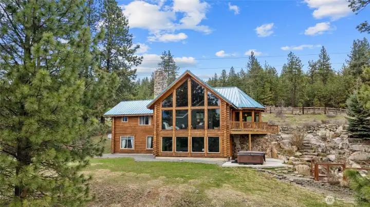 A log home in this setting offers timeless beauty and enduring appeal.
