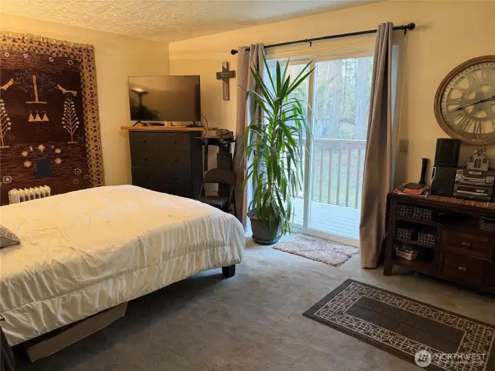 Primary bedroom with walkout deck