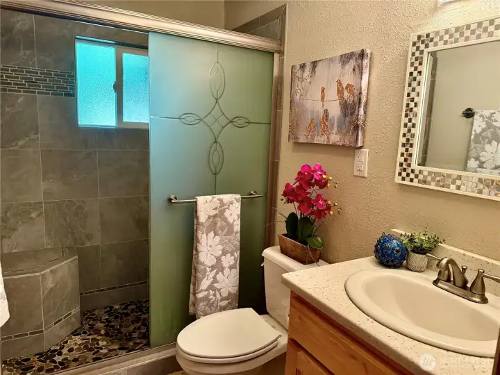 Updated bathroom w/ beautiful ceramic tile.