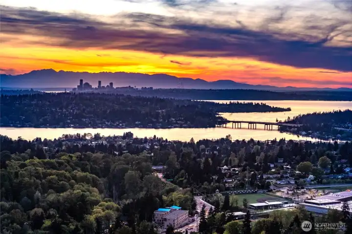 Panoramic vistas of Lake Washington, the iconic I-90 bridge, and the glittering skylines of Bellevue and Seattle