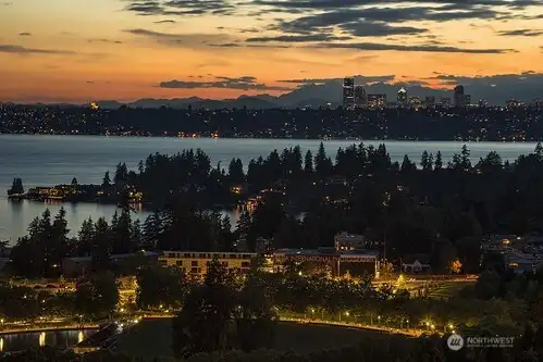 Panoramic vistas of Lake Washington, the iconic I-90 bridge, and the glittering skylines of Bellevue and Seattle