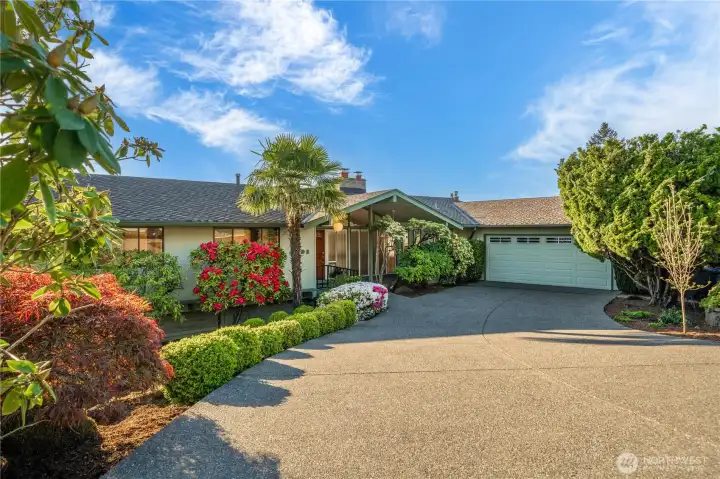 The 4-bedroom, 2.75-bath layout is thoughtfully arranged. 3 bedrooms on main and one on lower level with great views