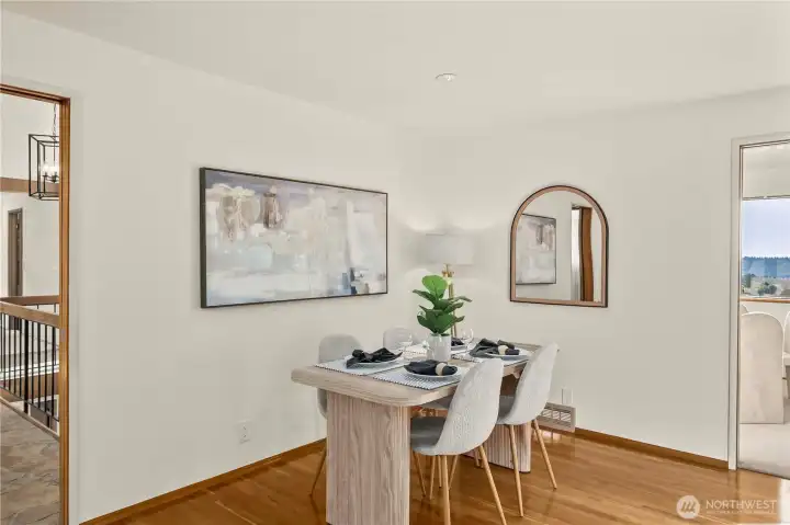 A charming breakfast nook adjacent to the kitchen, perfect for everyday dining