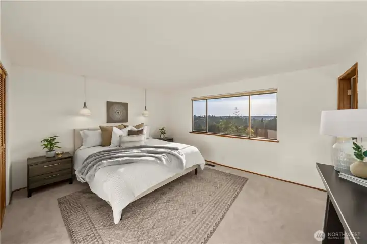 A view-oriented primary suite that serves as a tranquil retreat.