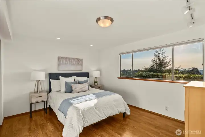 4th bedroom on lower level with beautiful views of the lake