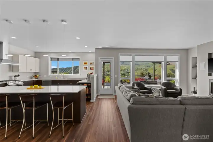 Open living looking to front patio which has sun shade