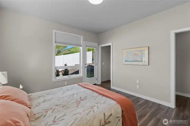 Primary bedroom with Spa-like en-suite. Right door leads to hall to office and living area