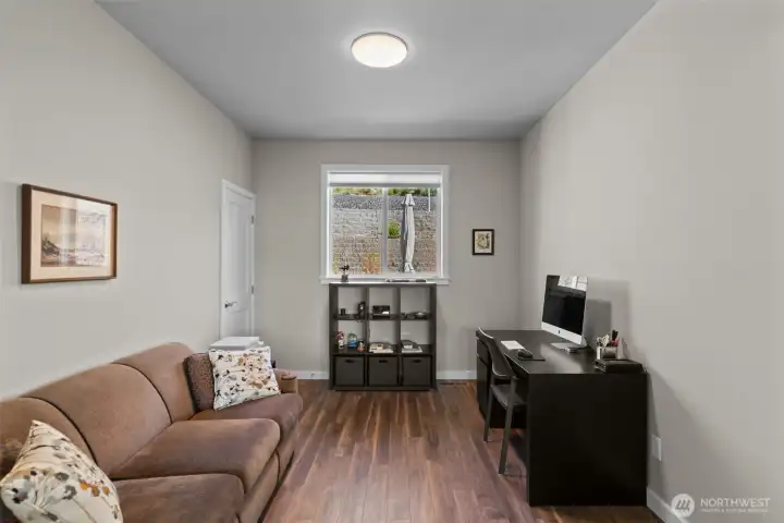 Office with closet and double pocket door.