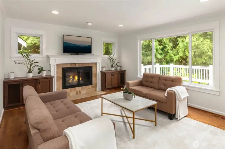 Second living room with gas fireplace.