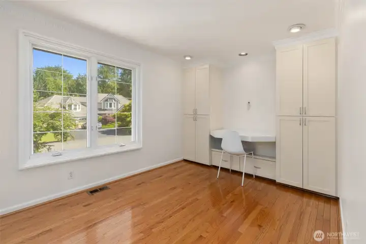 Bedroom #1 on upper level with murphy bed on the opposite wall. Makes a great bedroom or office!