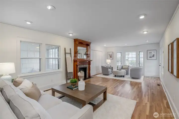 This generous family room has lots of flexible spaces for all your gatherings. A baby grand or grand piano fit easily in this room!