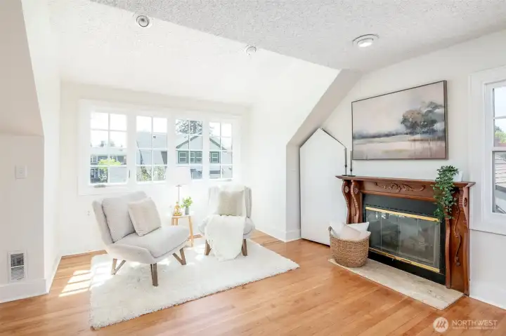 Picture yourself enjoying your morning coffee and a good book in this corner of the primary bedroom.