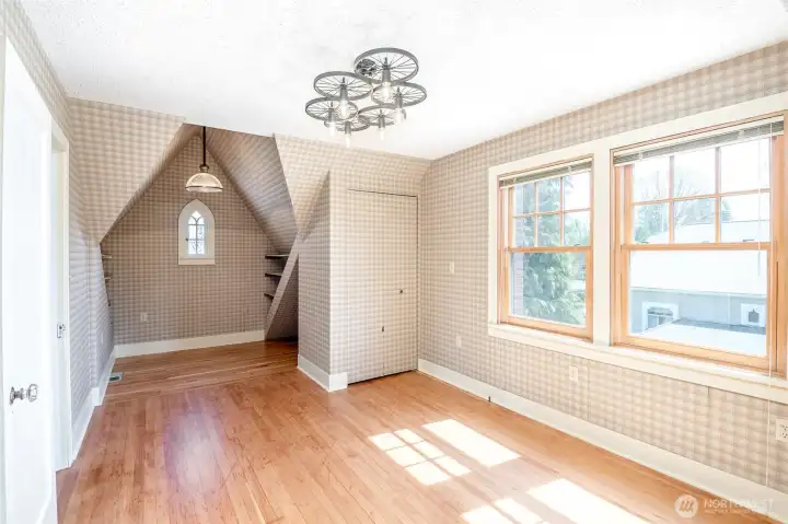 So many fun angles and features to this bedroom.