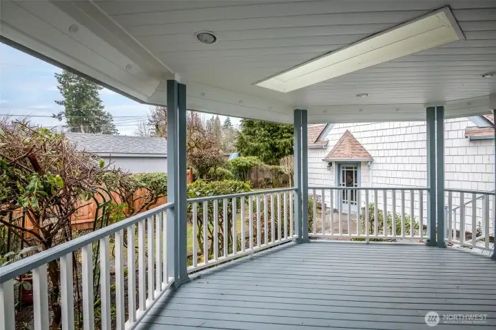 This expansive covered deck is perfect for dining or relaxing many months of the year.