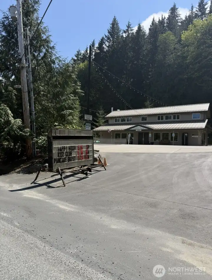 Community center with sports court located across the street from the boat launch.