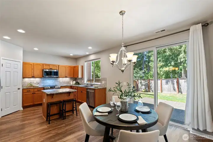 Spacious, bright kitchen with a large pantry and casual eating space. Perfectly set up for entertaining outside.