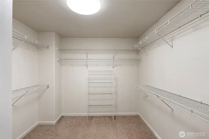 Spacious walk-in closet off the primary en-suite.