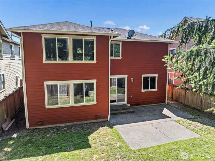 Private, fully fenced backyard with patio (off the kitchen area), perfect for outdoor entertaining.
